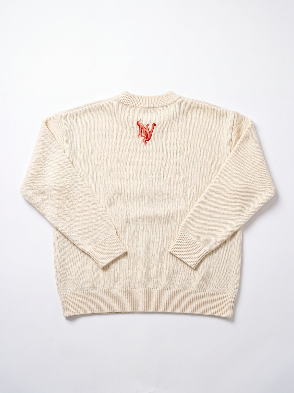 Hitodama Knit (Akane), back view with Novariv monogram on a light background