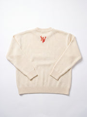 Hitodama Knit (Akane), back view with Novariv monogram on a light background